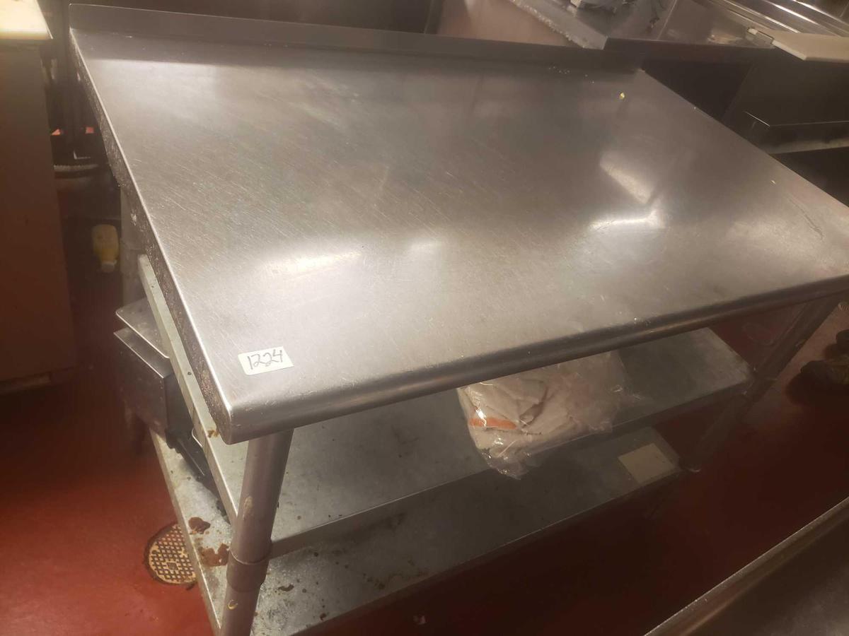 Stainless Steel prep table L 48in, W 29in, H 35in