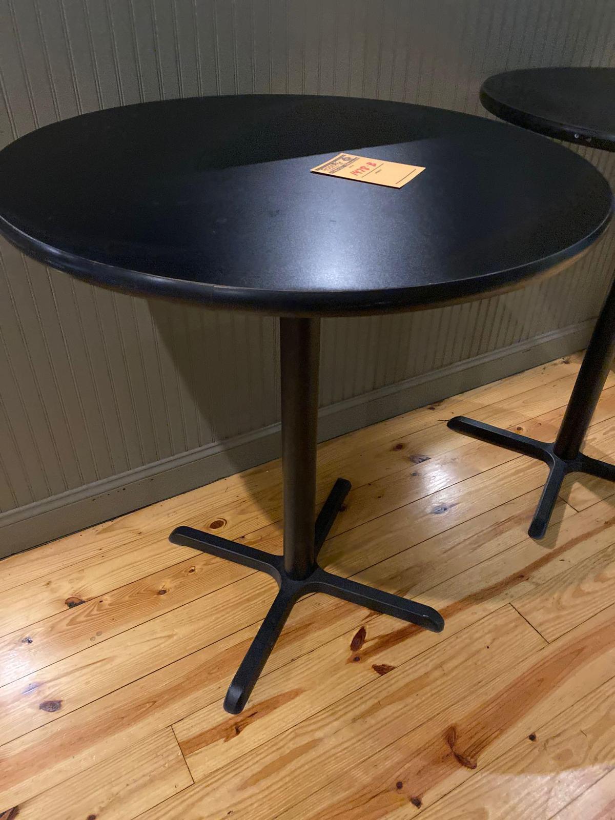 36 in diameter black high top table. 41 in high