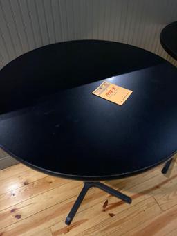 36 in diameter black high top table. 41 in high