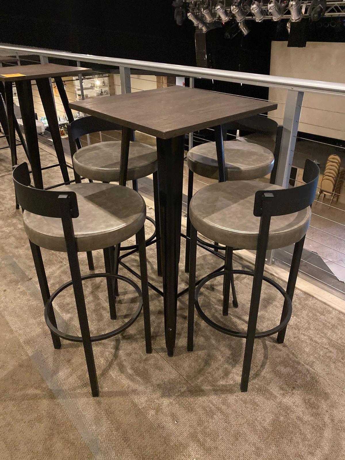 23 in x 23 in Wooden High Top/Metal Base Bistro Table-41 in high. Comes with 4 matching chairs