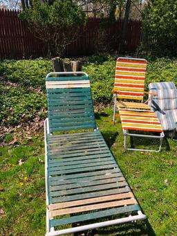 Outdoor chaise lounge chairs, metal cot Frame and random outdoor cushions