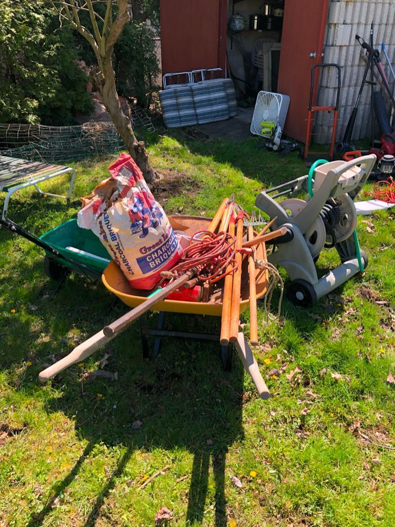 Wheelbarrow, hose wheel cart and other random yard items