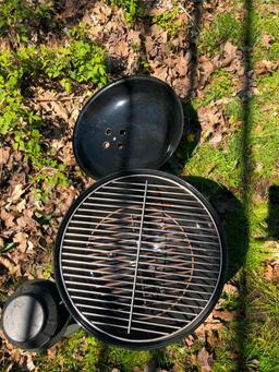 Weber charcoal grill and camping lantern