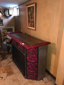 Retro bar with red velvet accents and vintage stereo components