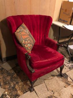 Wingback red velvet chair on claw and ball foot