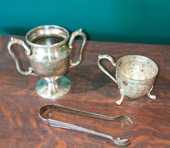 Silver plated tongs and tea set items