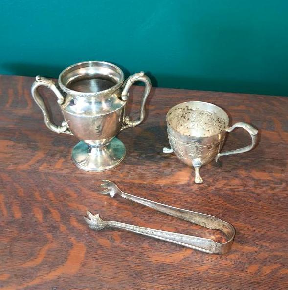 Silver plated tongs and tea set items