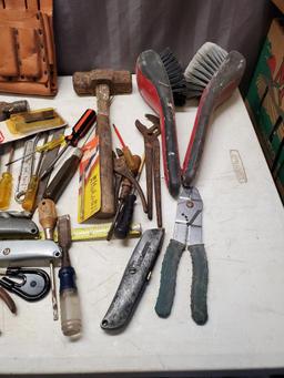 Large lot of assorted tools, tool pouches, sawhorse brackets and more