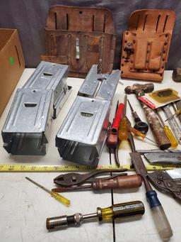 Large lot of assorted tools, tool pouches, sawhorse brackets and more