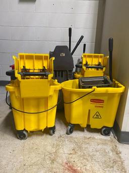 Group of Rolling Mop Buckets