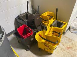 Group of Rolling Mop Buckets