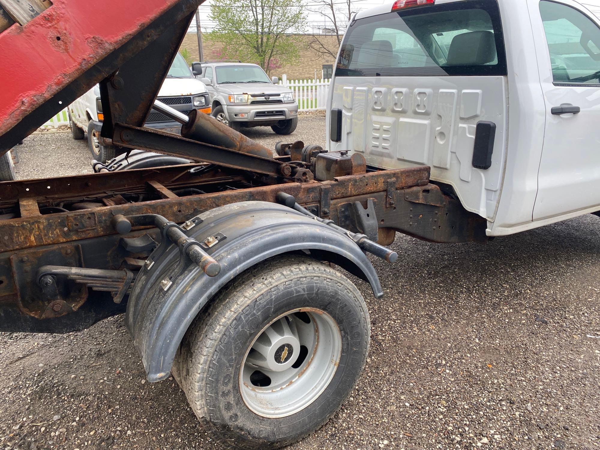 2016 Chevy 3500 4x4 Dumping Stake Body Truck