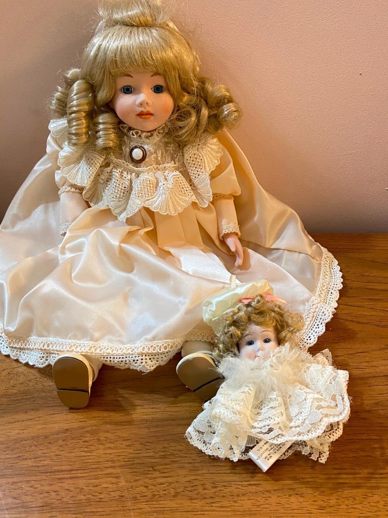 Porcelain Mann Doll and Head with 2 other Porcelain Dolls