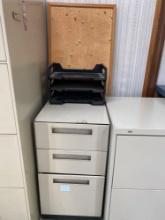Metal file cabinet with bulletin board