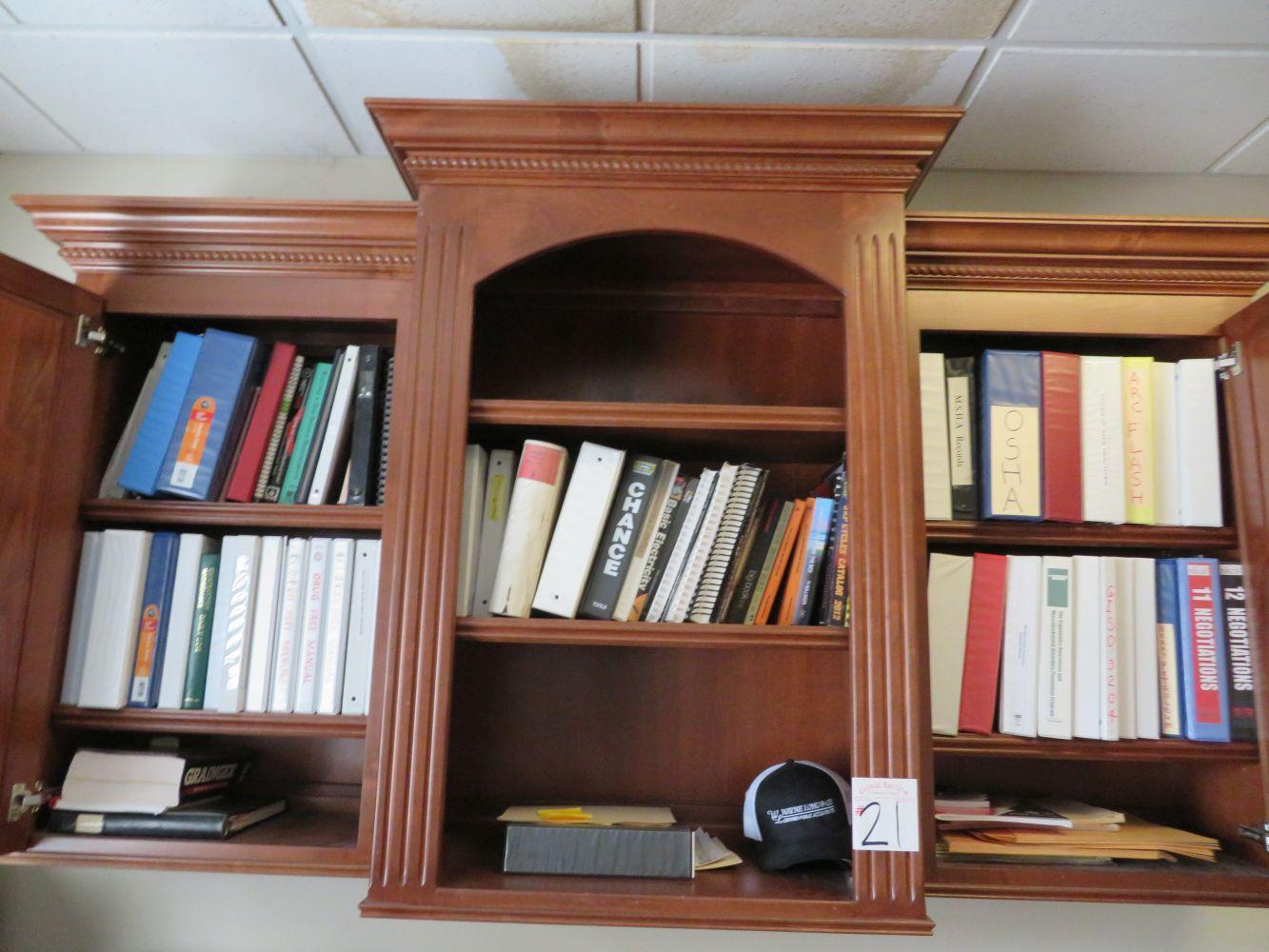 Books in cabinet- Cabinet Does Not Go