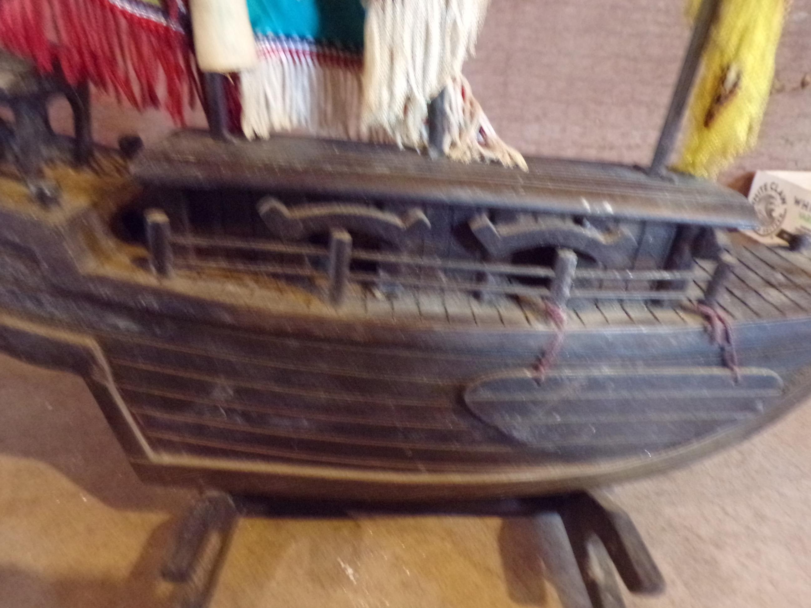 Wooden boat with stand