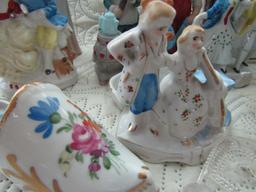 Variety of Vintage Figurines and Victorian Shoes