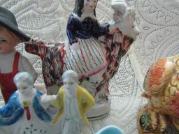 Variety of Vintage Figurines and Victorian Shoes