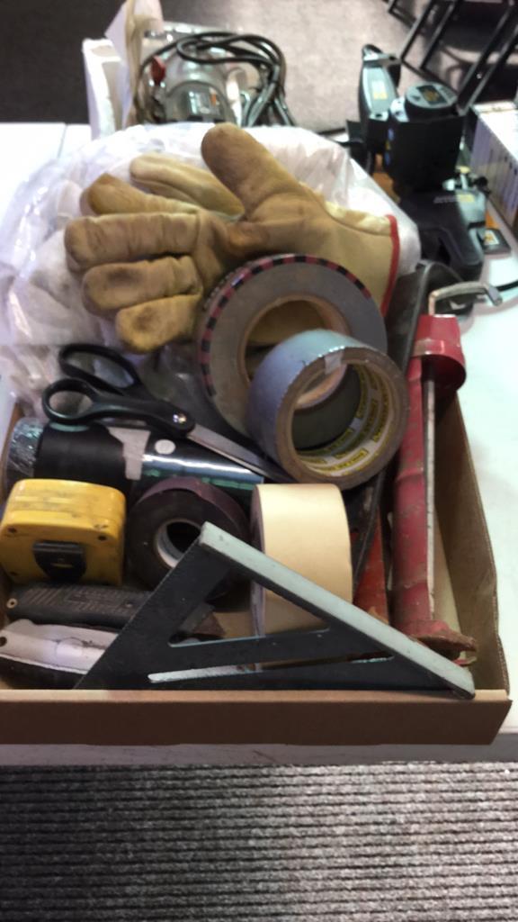 Box of caulking guns, duct & electrical tape,