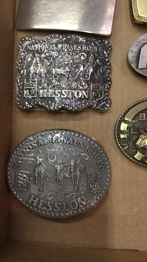 Lot of belt buckles & lighters