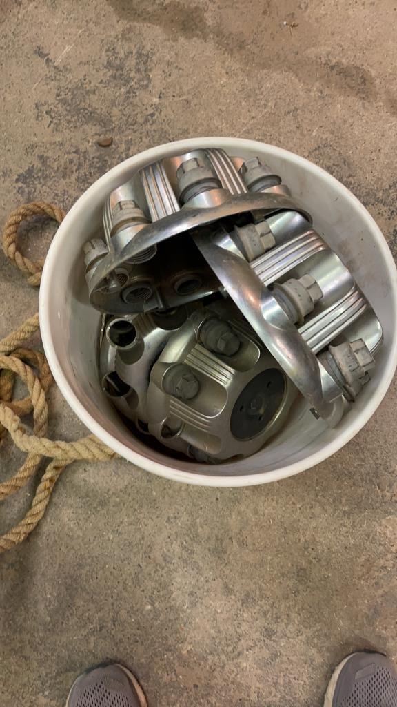Bucket of hub caps