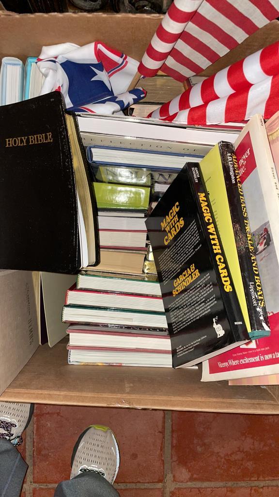 Box of misc books & small U.S. flags