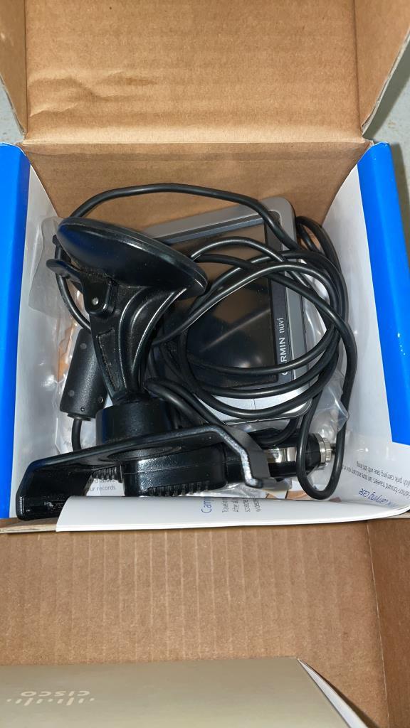 Box of ATT microcell, Netgear & Garmin