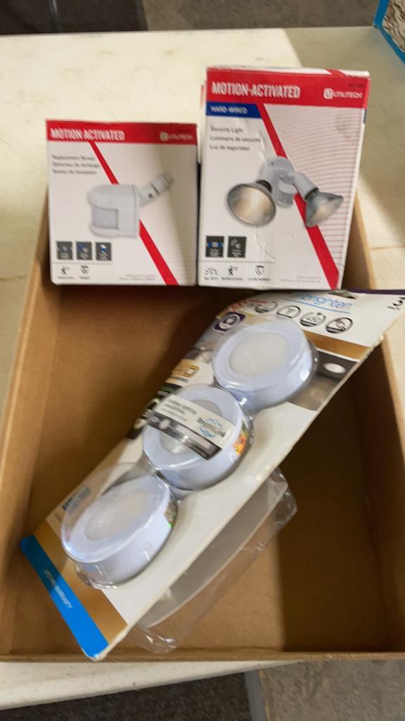 Box of security light,motion sensor & puck lights