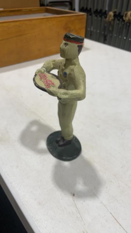 Coca-Cola cast iron figure