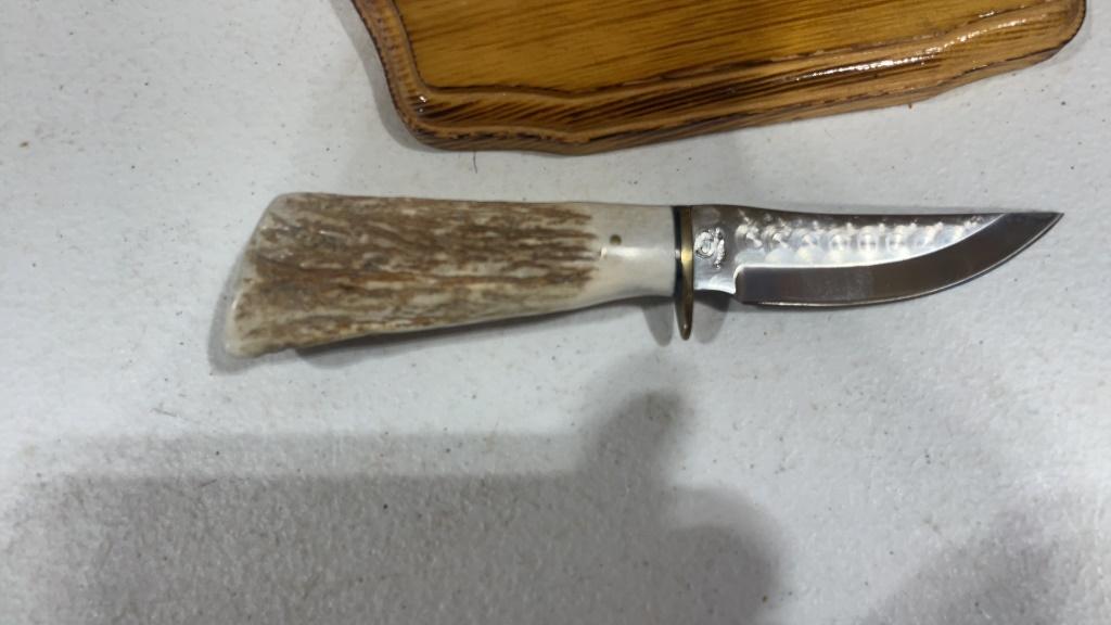 Hand made knife on display stand