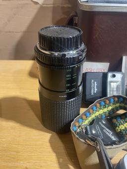 Minolta XG-9 camera w/flash,2 lens & case