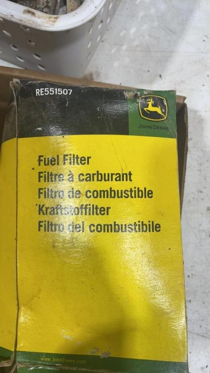 Box of John Deere filters & parts