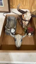 Box of cow skull decor