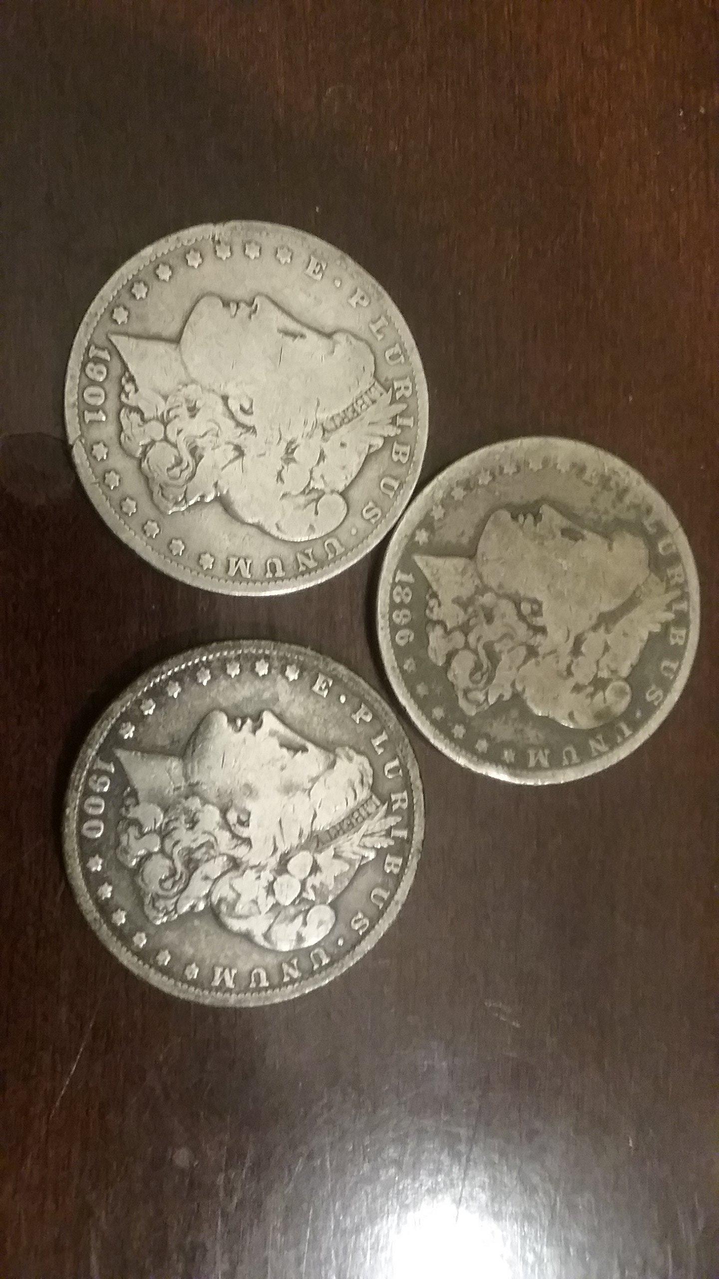 Here's a trio of thoroughly enjoyed Morgan Dollars