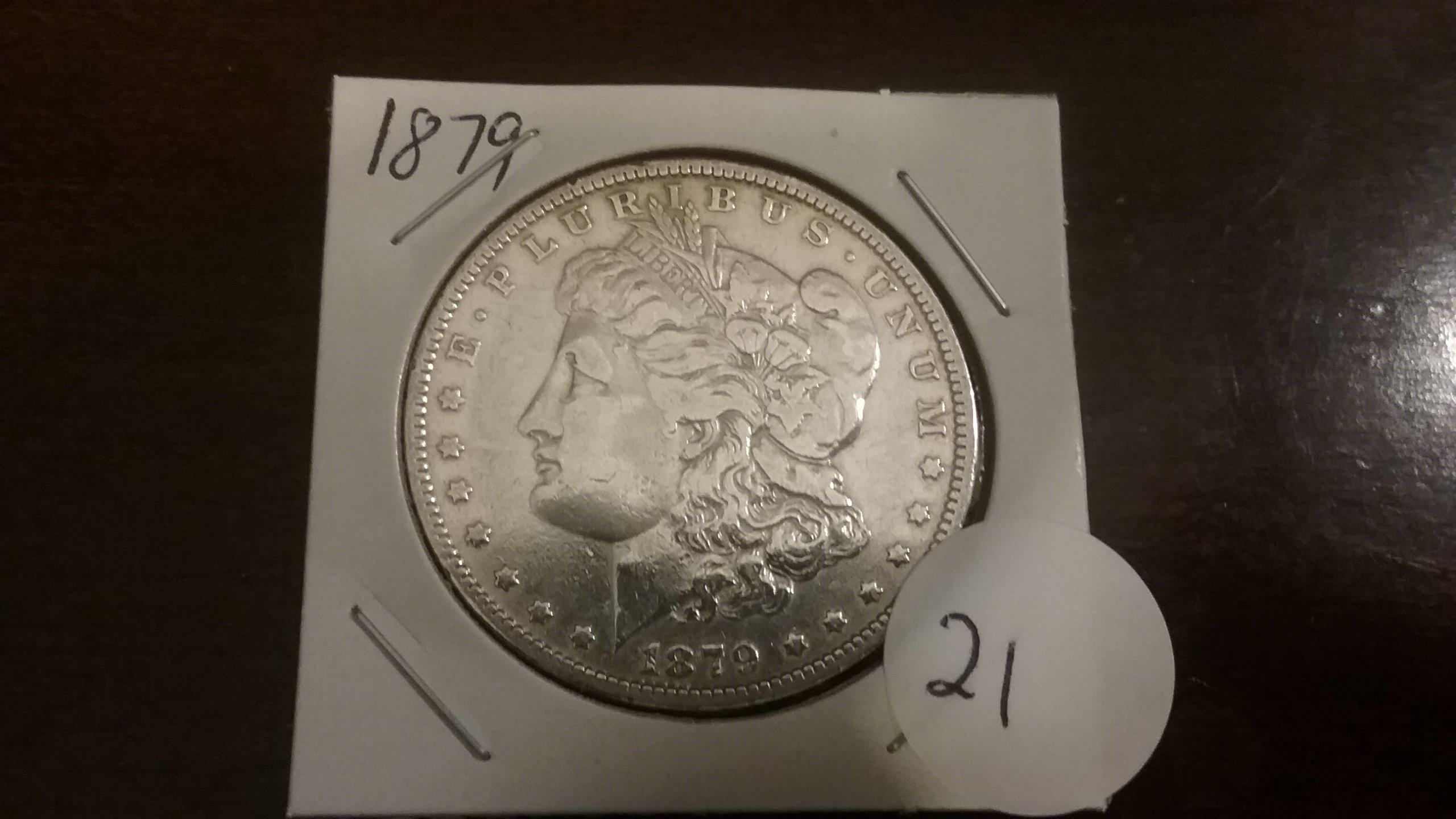 1879 Morgan Dollar  (probably cleaned)