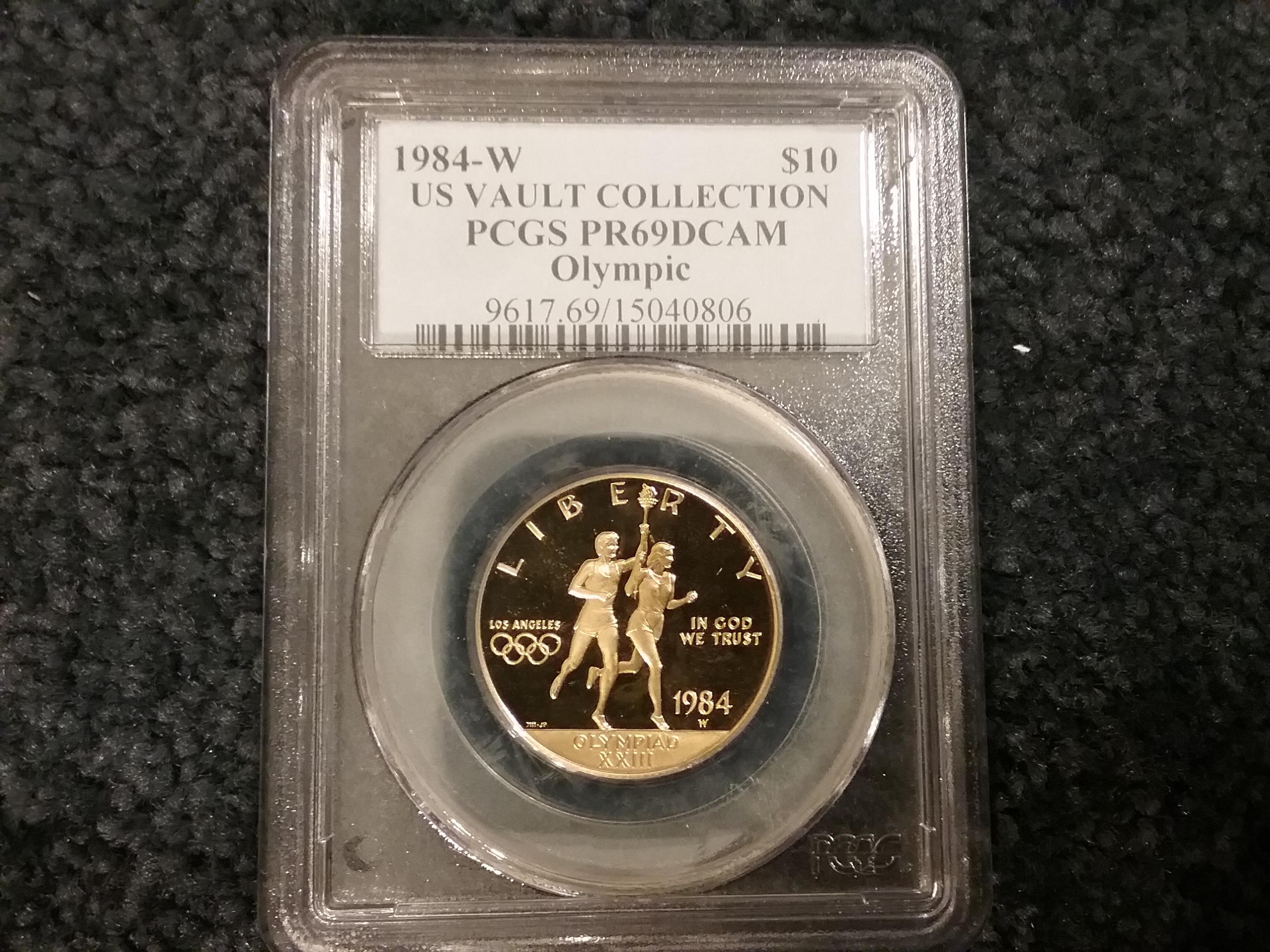 AUCTION HIGHLIGHT! Absolutely Stunning 1984 4-coin Gold Commemorative Set