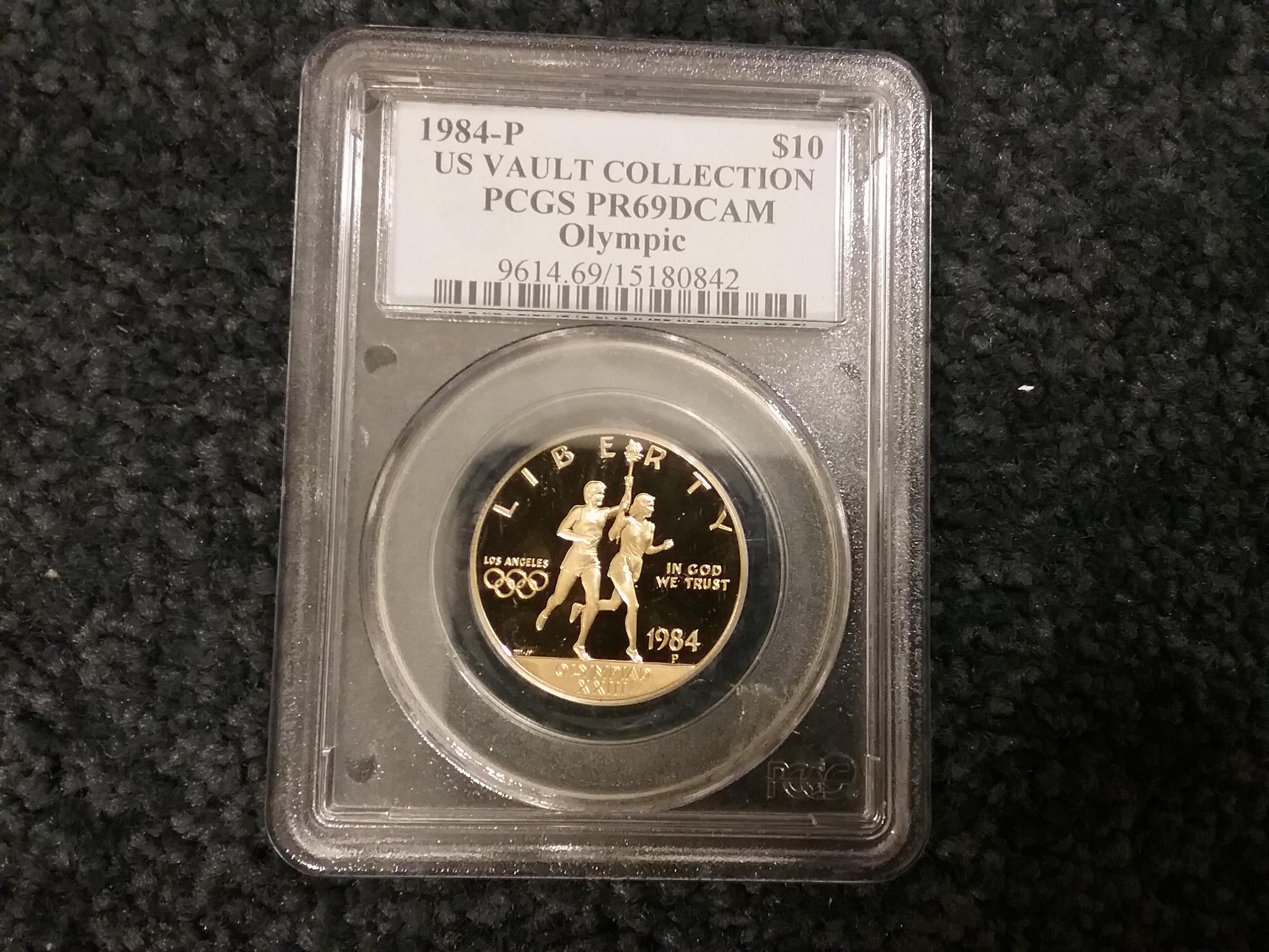 AUCTION HIGHLIGHT! Absolutely Stunning 1984 4-coin Gold Commemorative Set