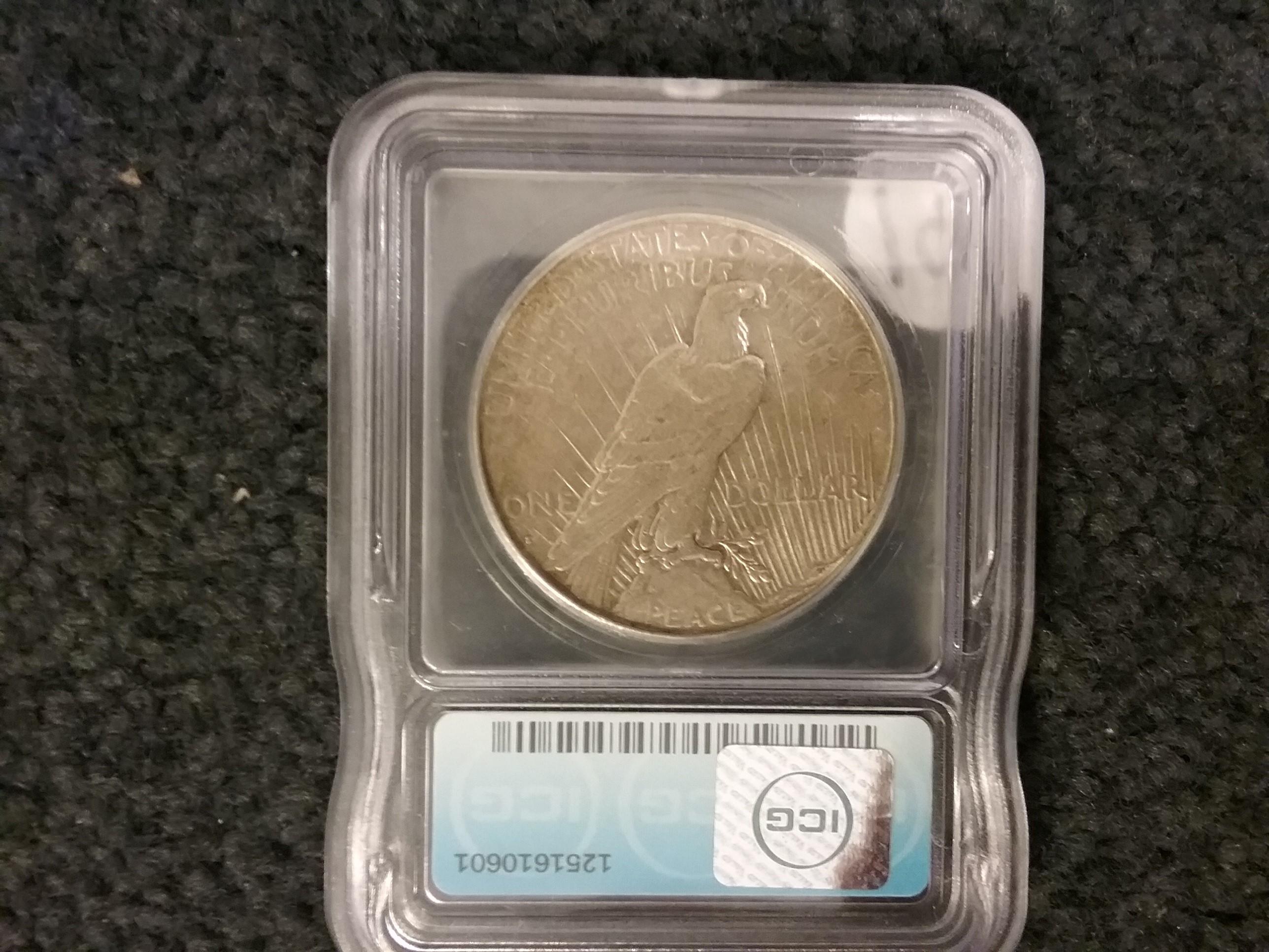 ICG semi-key 1934-S Peace Dollar in AU-50