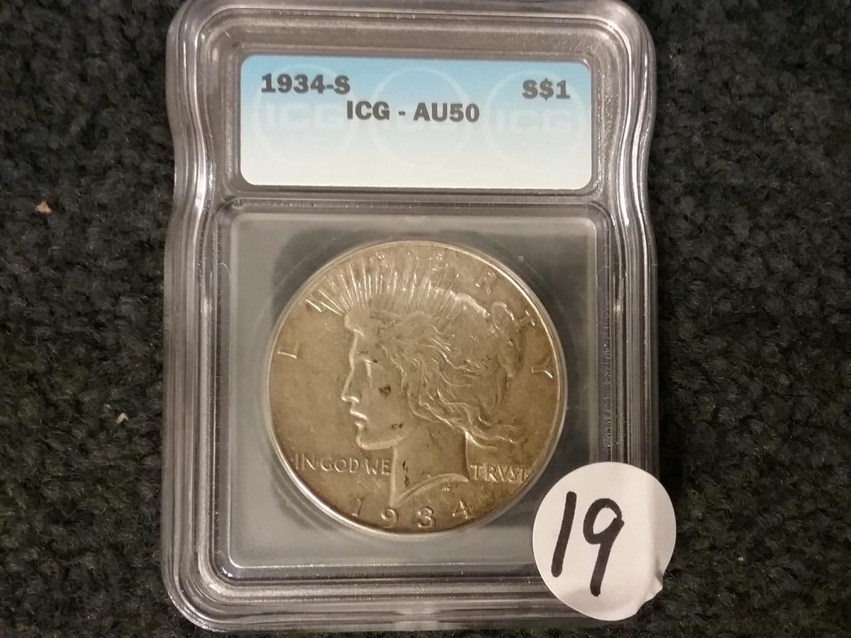 ICG semi-key 1934-S Peace Dollar in AU-50