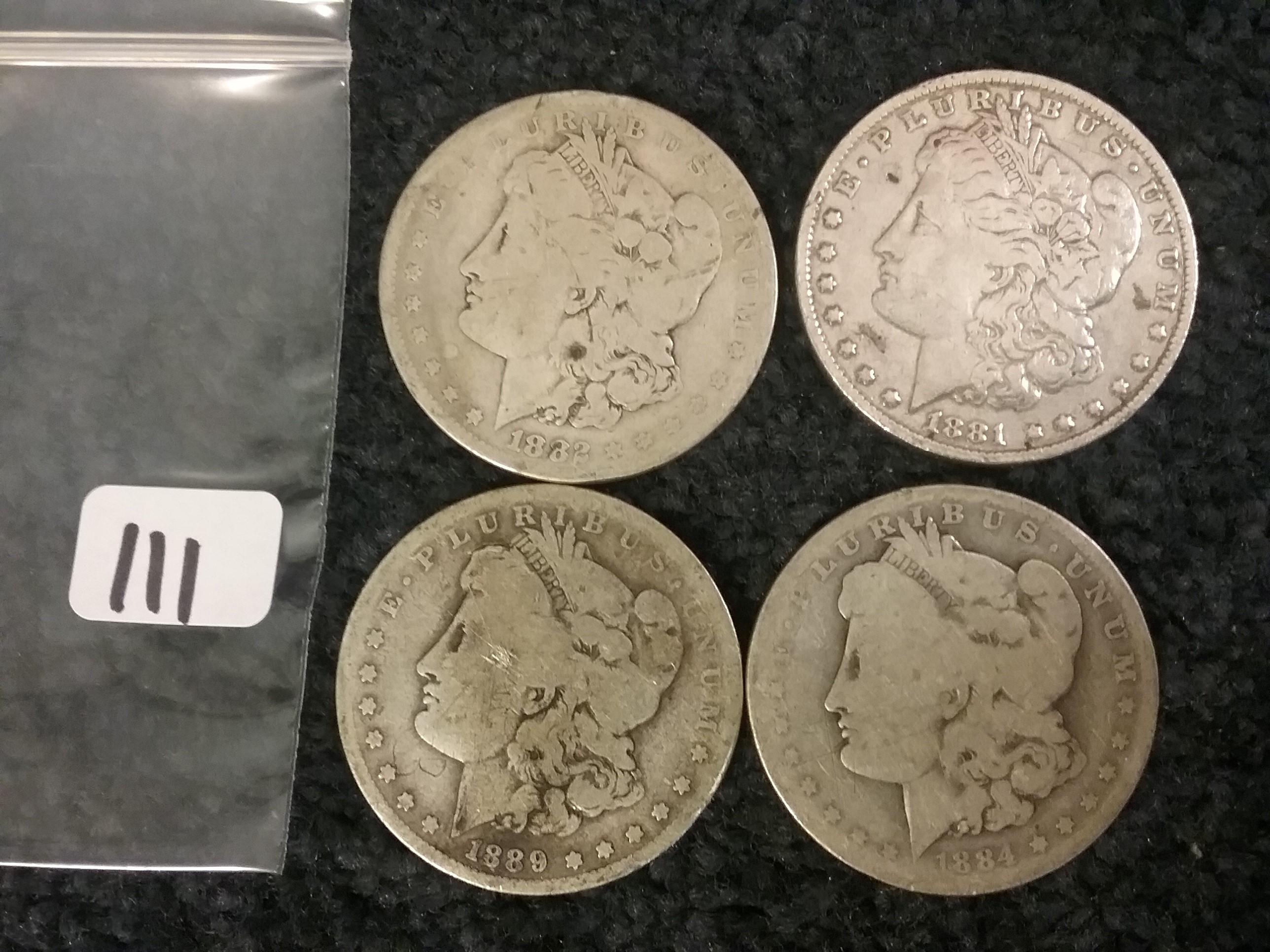 Group of Four Morgan Dollars