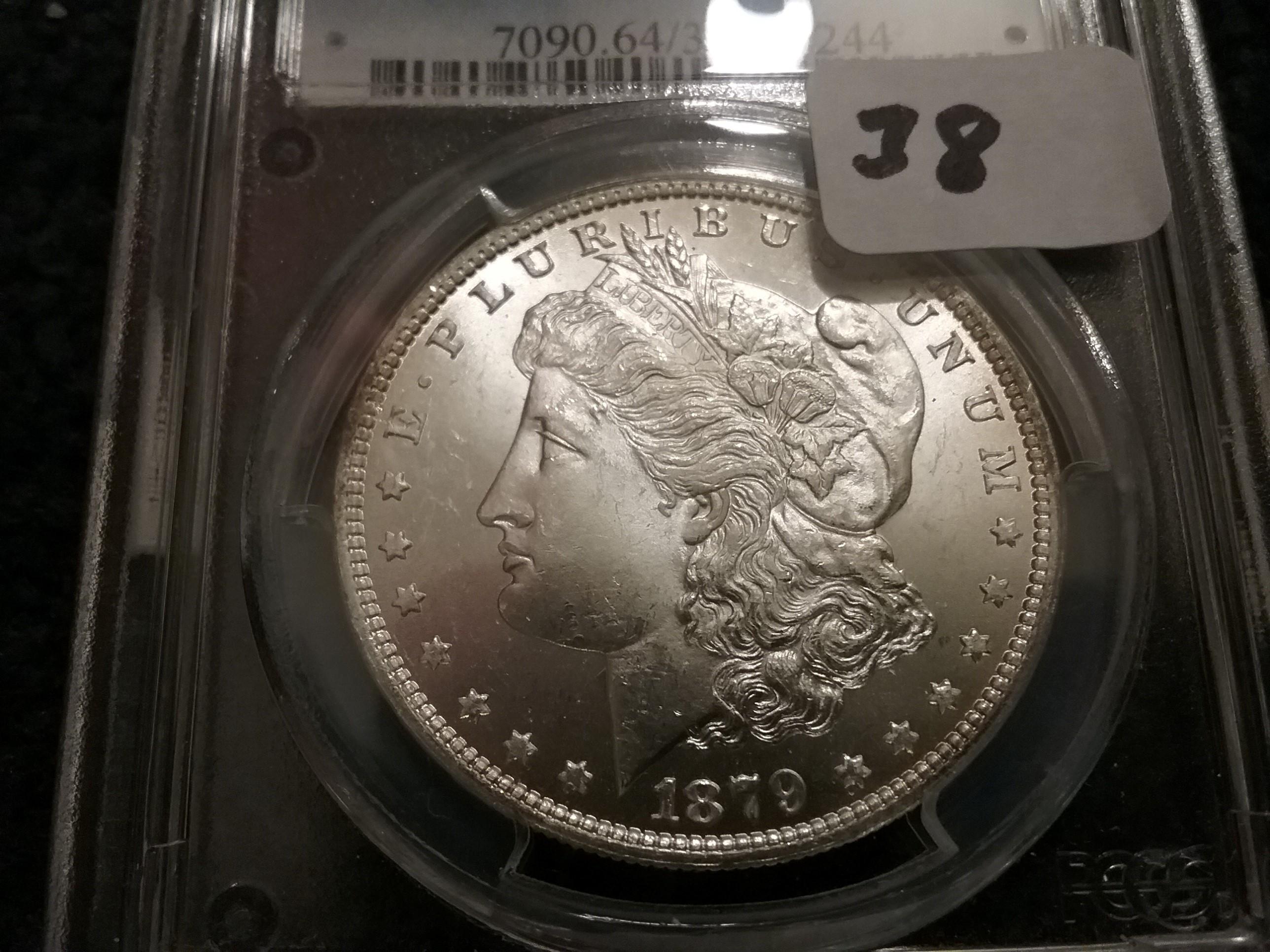 PCGS 1879-O Morgan Dollar in MS-64