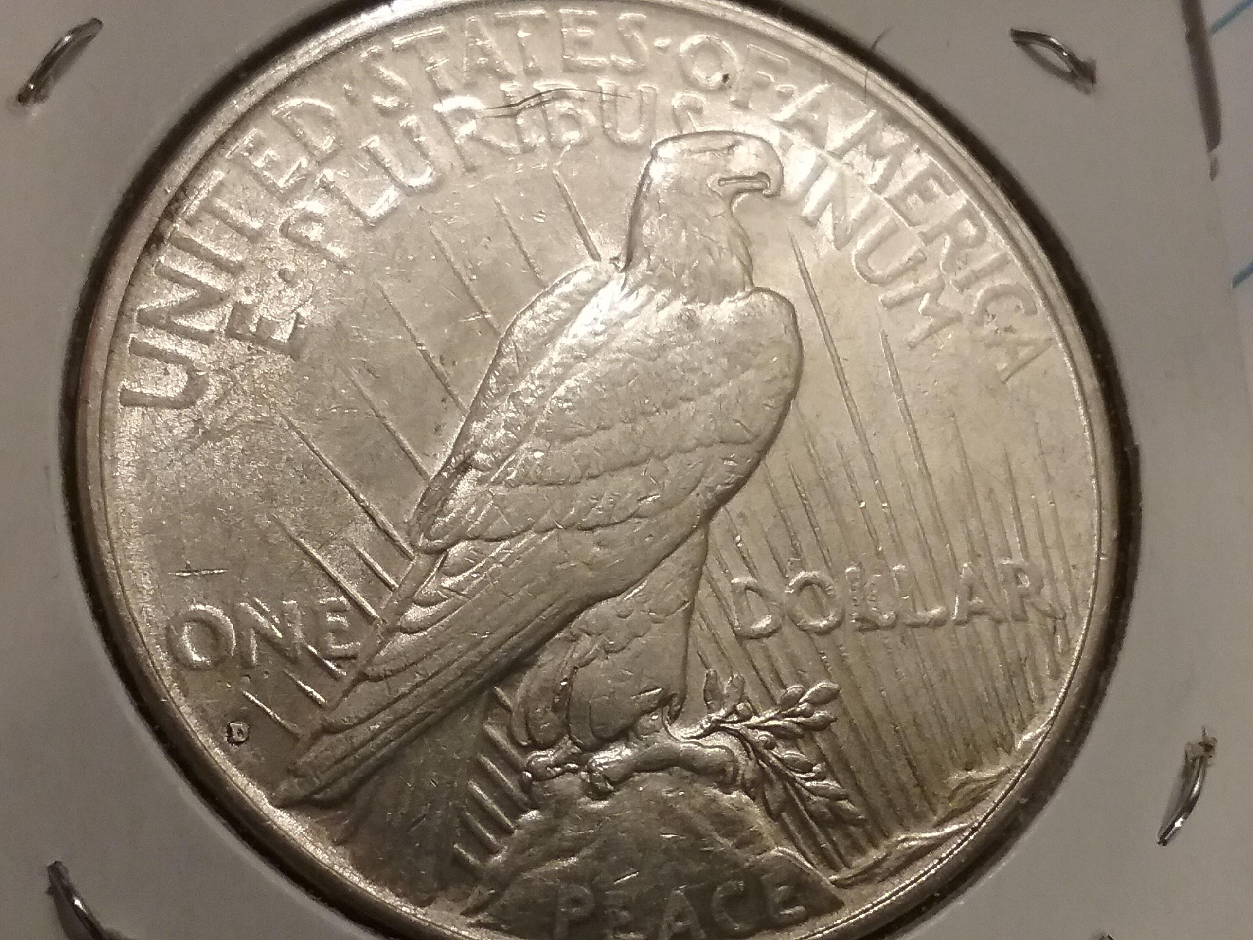 1934-D Peace Dollar in Au-55