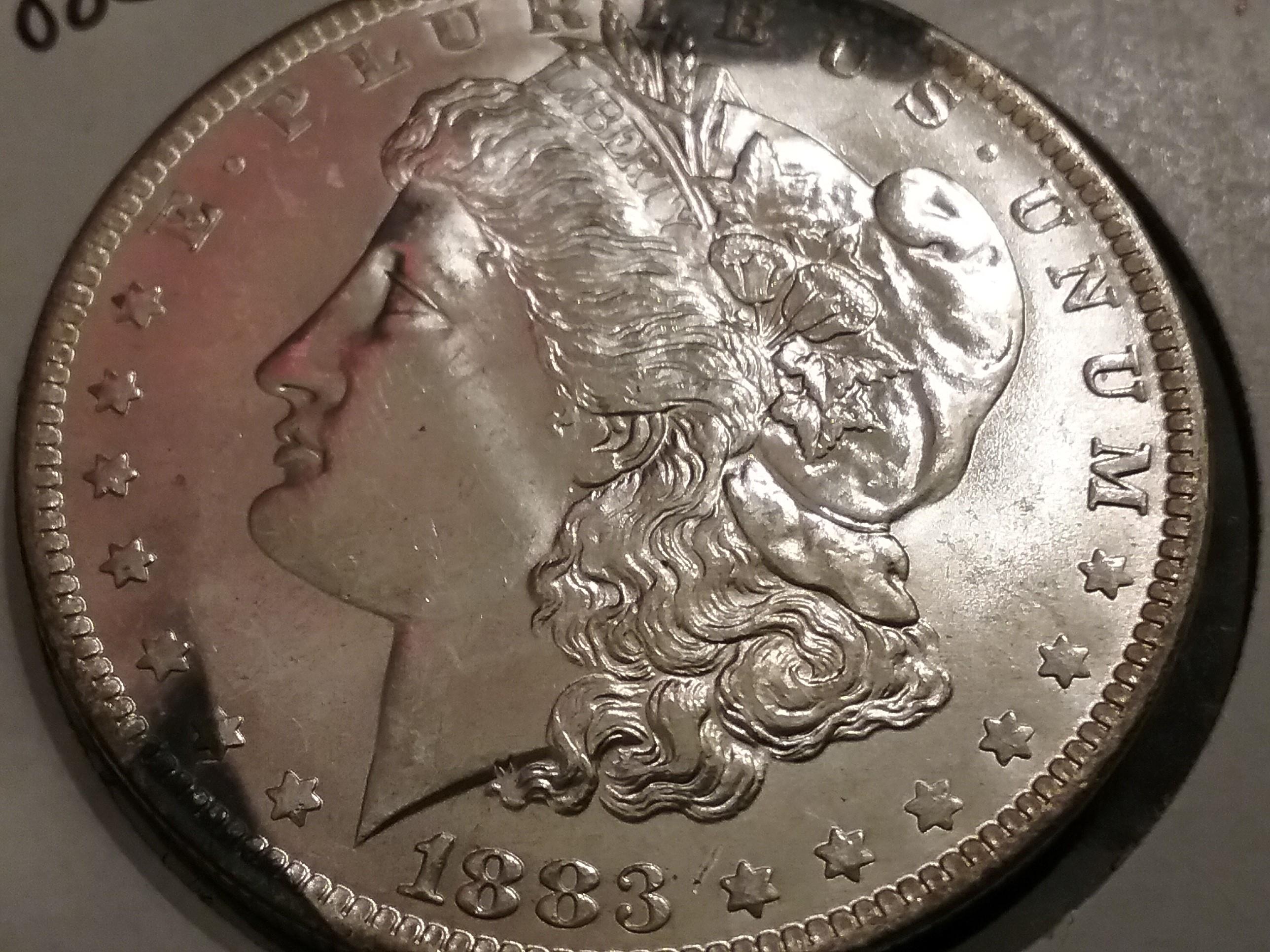 1883-O Morgan Dollar in MS-64