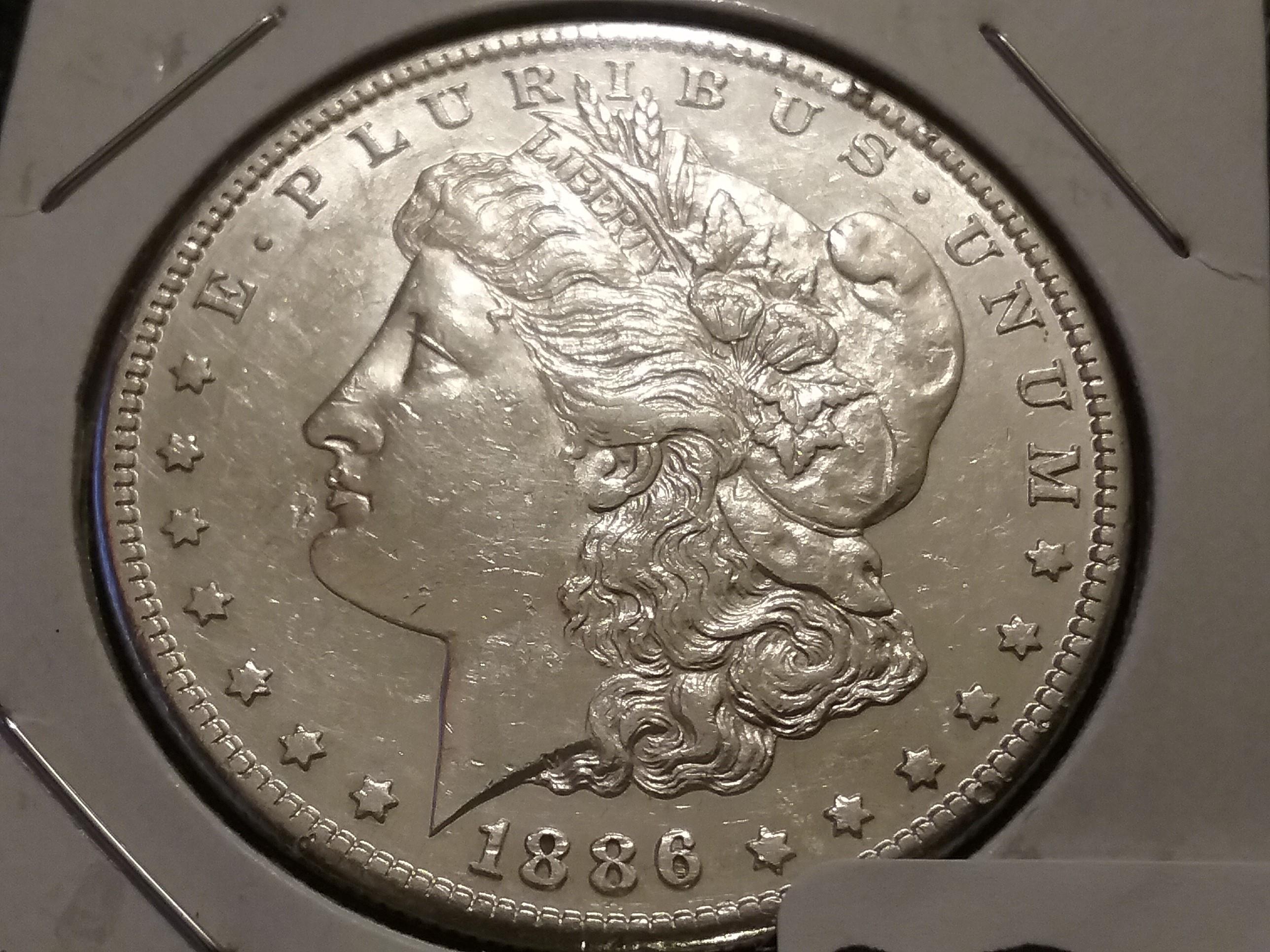 1886-S Morgan Dollar in AU-53