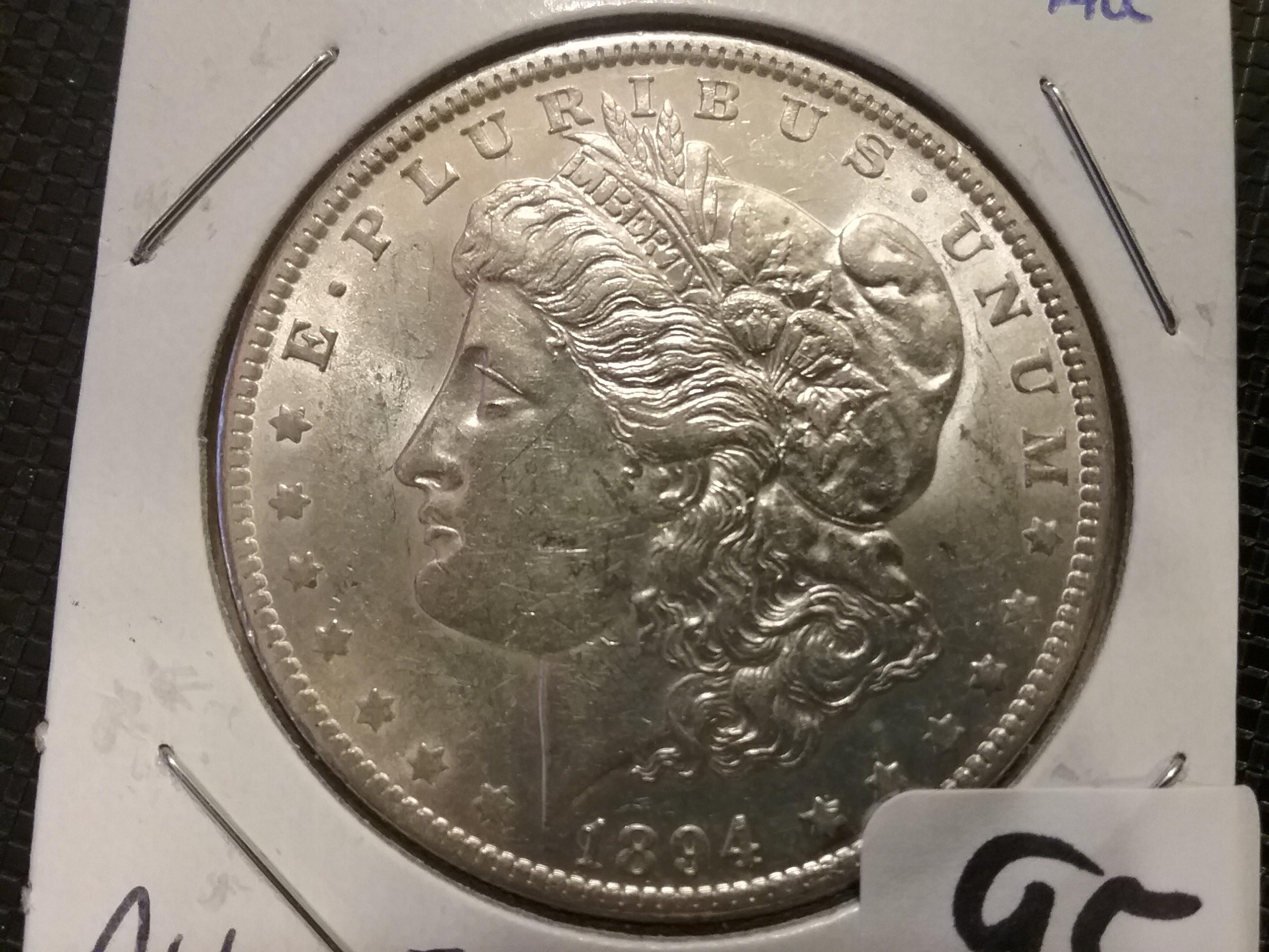 1894-O morgan Dollar in AU-55