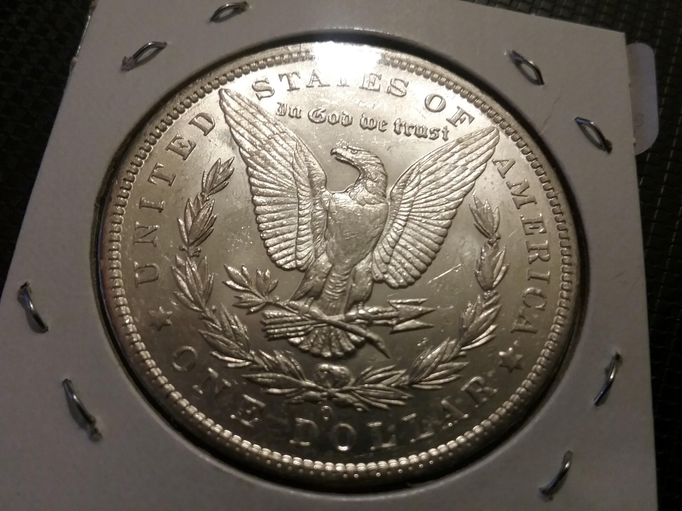 1894-O morgan Dollar in AU-55