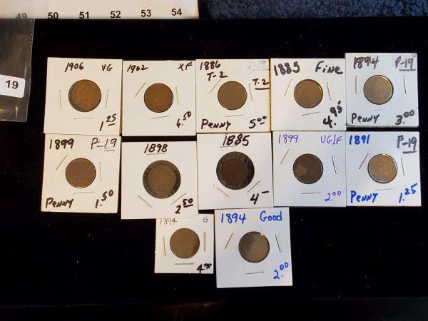 Ten assorted date Indian head cents