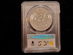 PCGS 1884 Morgan Dollar in Mint State 63