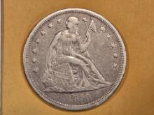 ** 1860-O Seated Liberty Dollar in Very Fine Plus