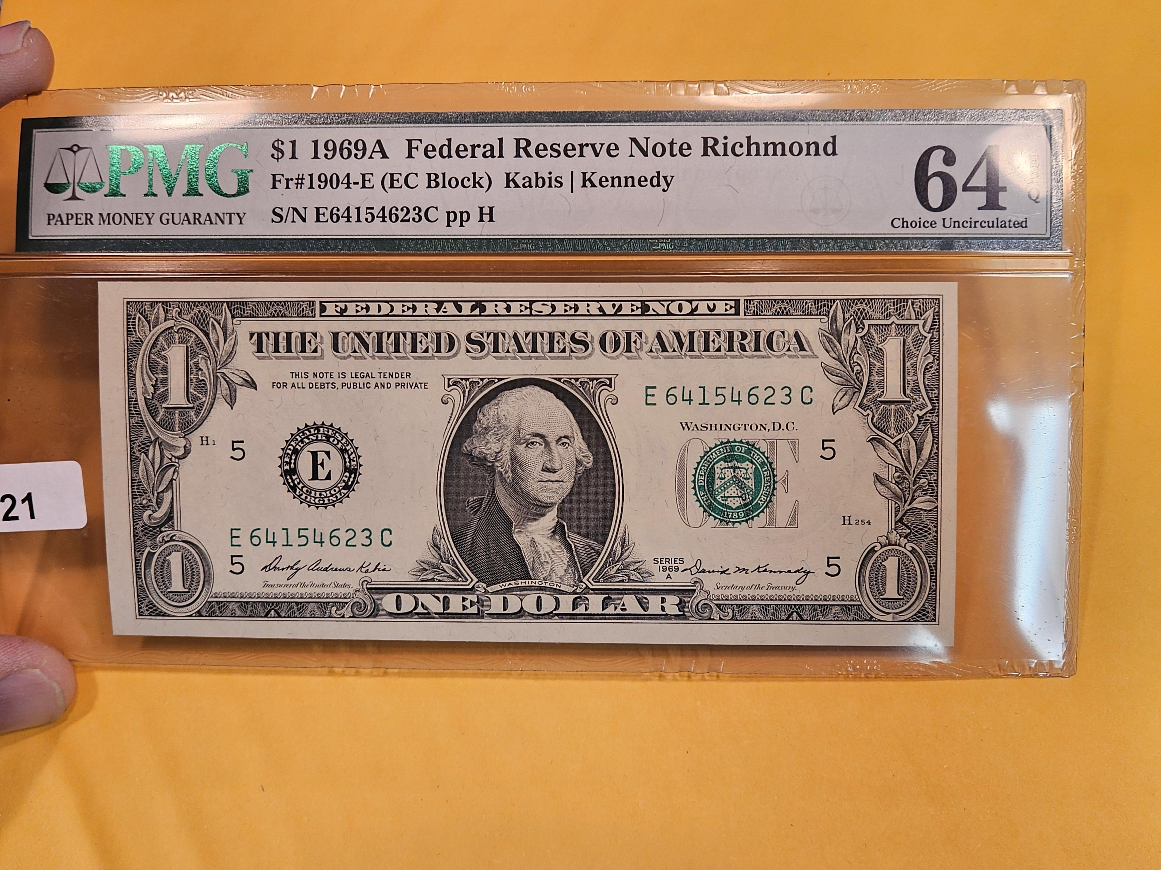 PMG 1969-A One Dollar FRN in Choice Unc 64 EPQ